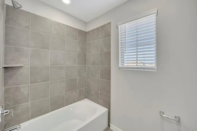 a bathroom with a bathtub