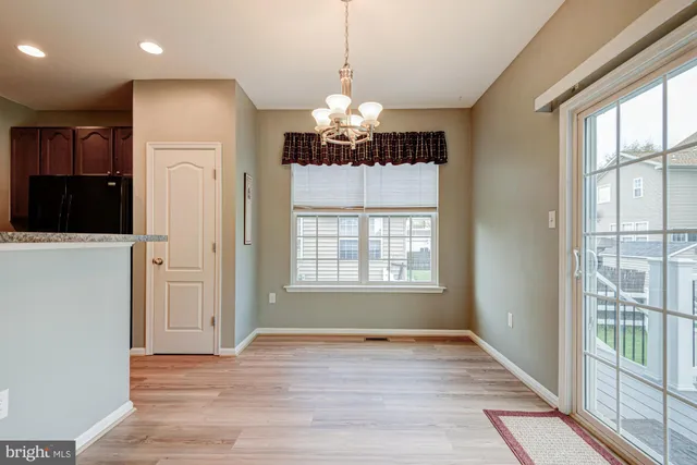 a kitchen that has a sink and a stove