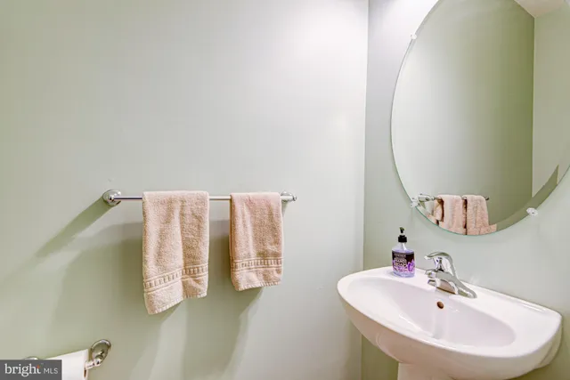 an empty room and a ceiling fan and a window