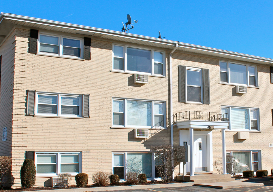 5041 North East River Road, Unit 3A Norridge, IL 60706 - Photo 1 of 12 a front view of a building with a street