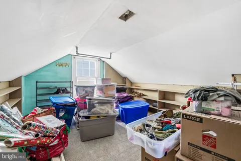 a living room with lots of stuff and furniture