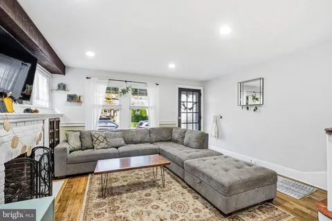a living room with furniture and a couch