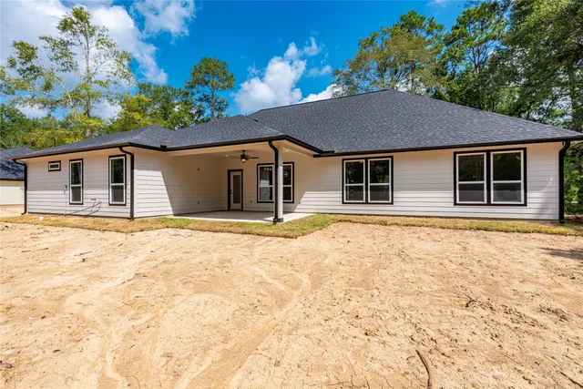 a house view with a outdoor space