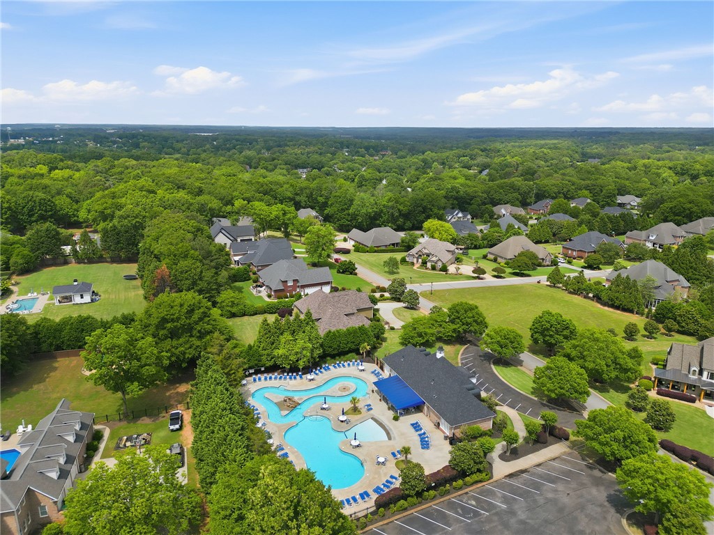 138 Buckland Drive Anderson, SC 29621 - Photo 47 of 49 Vast green landscapes surround a lively community pool and inviting residential properties.