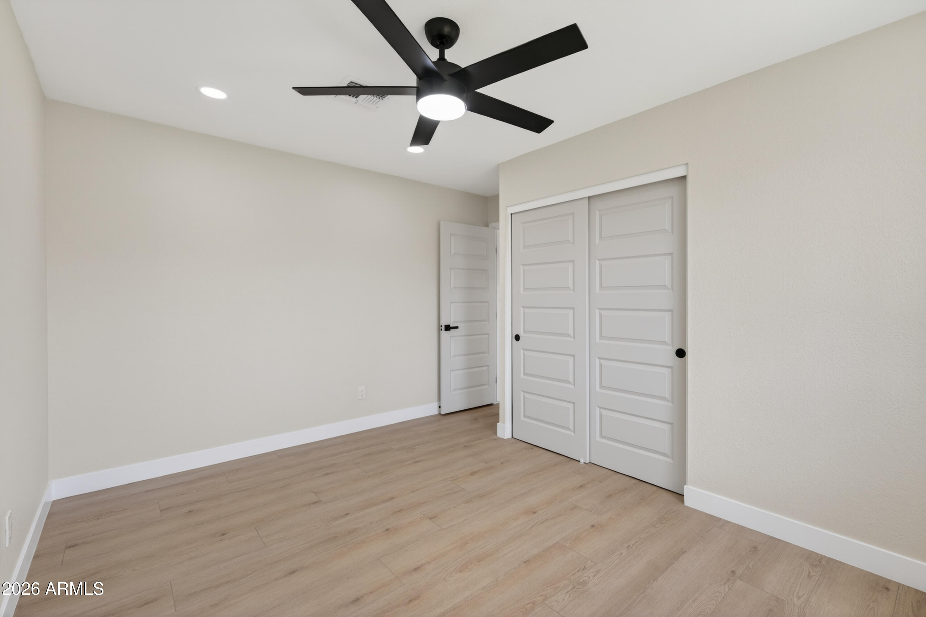 3422 South Terrace Road Tempe, AZ 85282 - Photo 28 of 43 an empty room with closet and fan