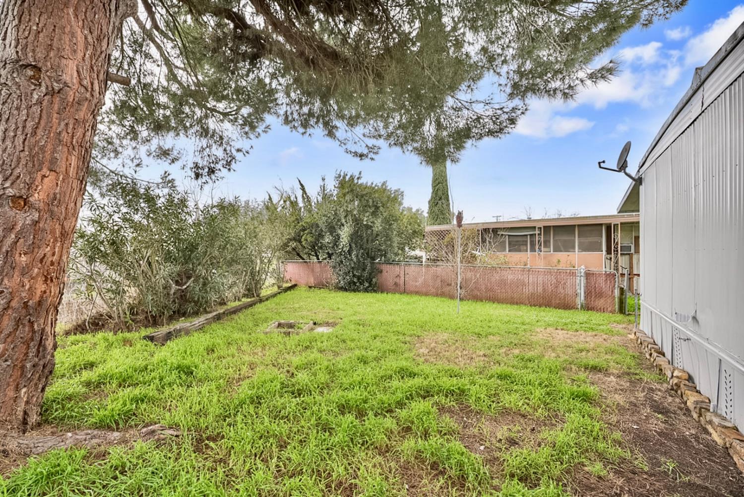 3505 Gateway Road, Unit F242 Bethel Island, CA 94511 - Photo 11 of 22 a view of backyard with green space