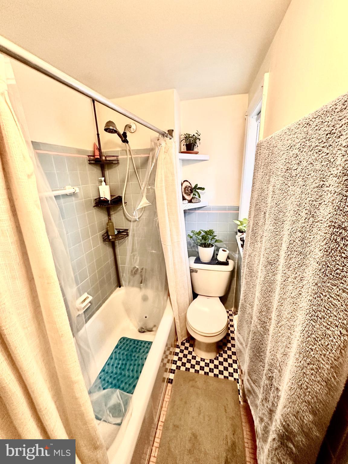243 West Rittenhouse Street, Unit 2C Philadelphia, PA 19144 - Photo 8 of 9 a bathroom with a sink and toilet