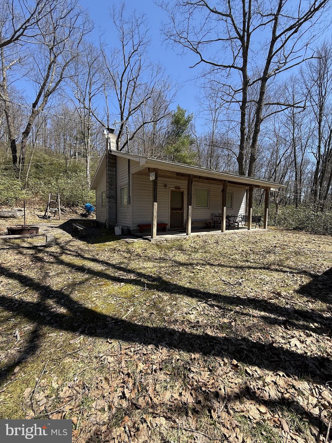 a house with trees in the background