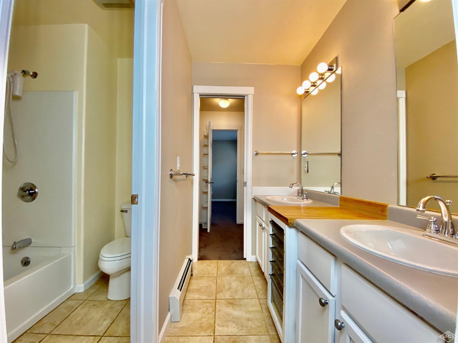 2455 Old Trail Road, Unit D Avon, CO 81620 - Photo 15 of 23 Upstairs Bathroom Shared By Bedrooms 2 a