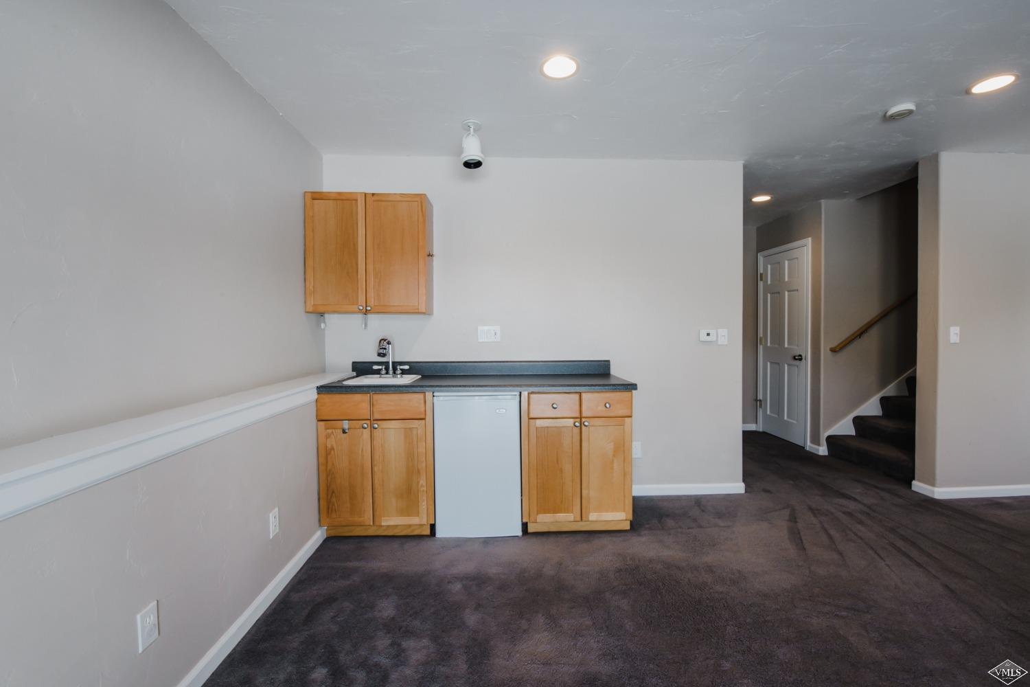2455 Old Trail Road, Unit D Avon, CO 81620 - Photo 17 of 23 Wetbar in Downstairs Bedroom