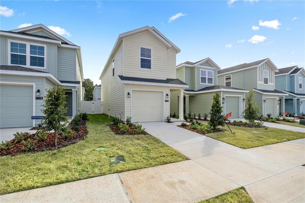 7195 Southwest 92nd Street Ocala, FL 34476 - Photo 6 of 7 a front view of a house with entertaining space