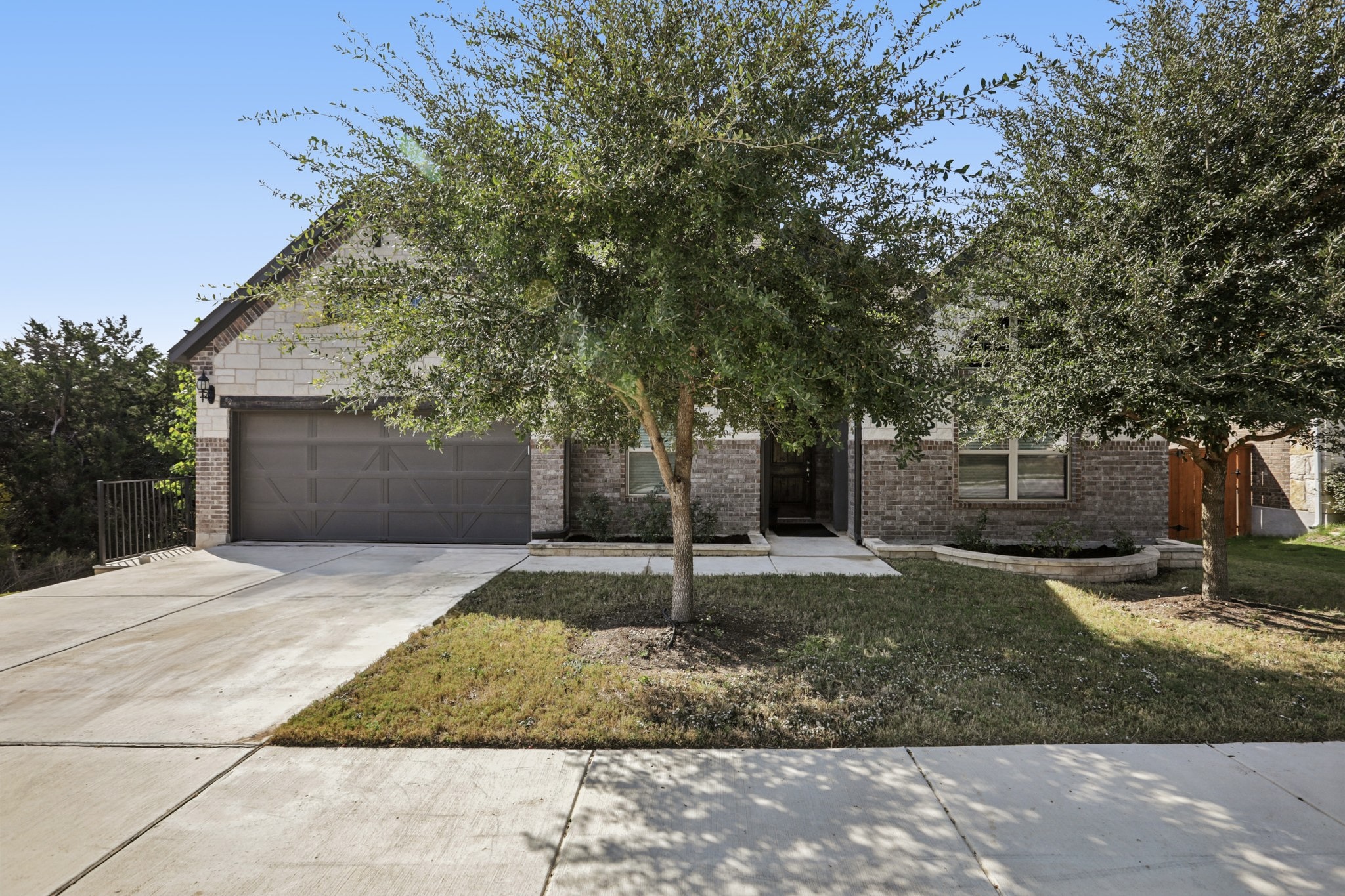 210 Barton Run Drive Georgetown, TX 78628 - Photo 2 of 40 a backyard of a house with lots of green space
