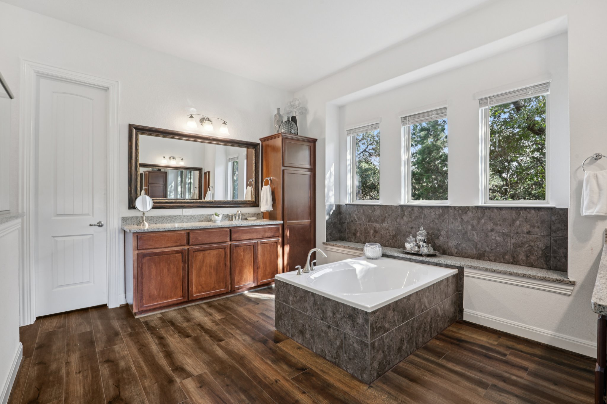210 Barton Run Drive Georgetown, TX 78628 - Photo 33 of 40 a bathroom with a sink and a mirror