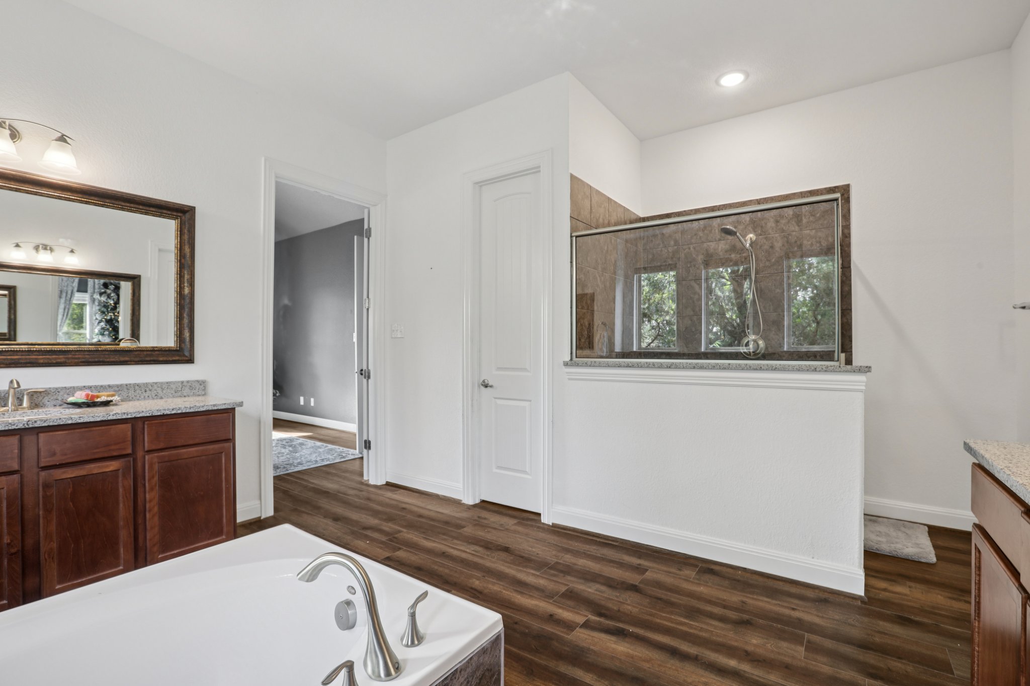 210 Barton Run Drive Georgetown, TX 78628 - Photo 35 of 40 a view of a room with wooden floor and cabinet