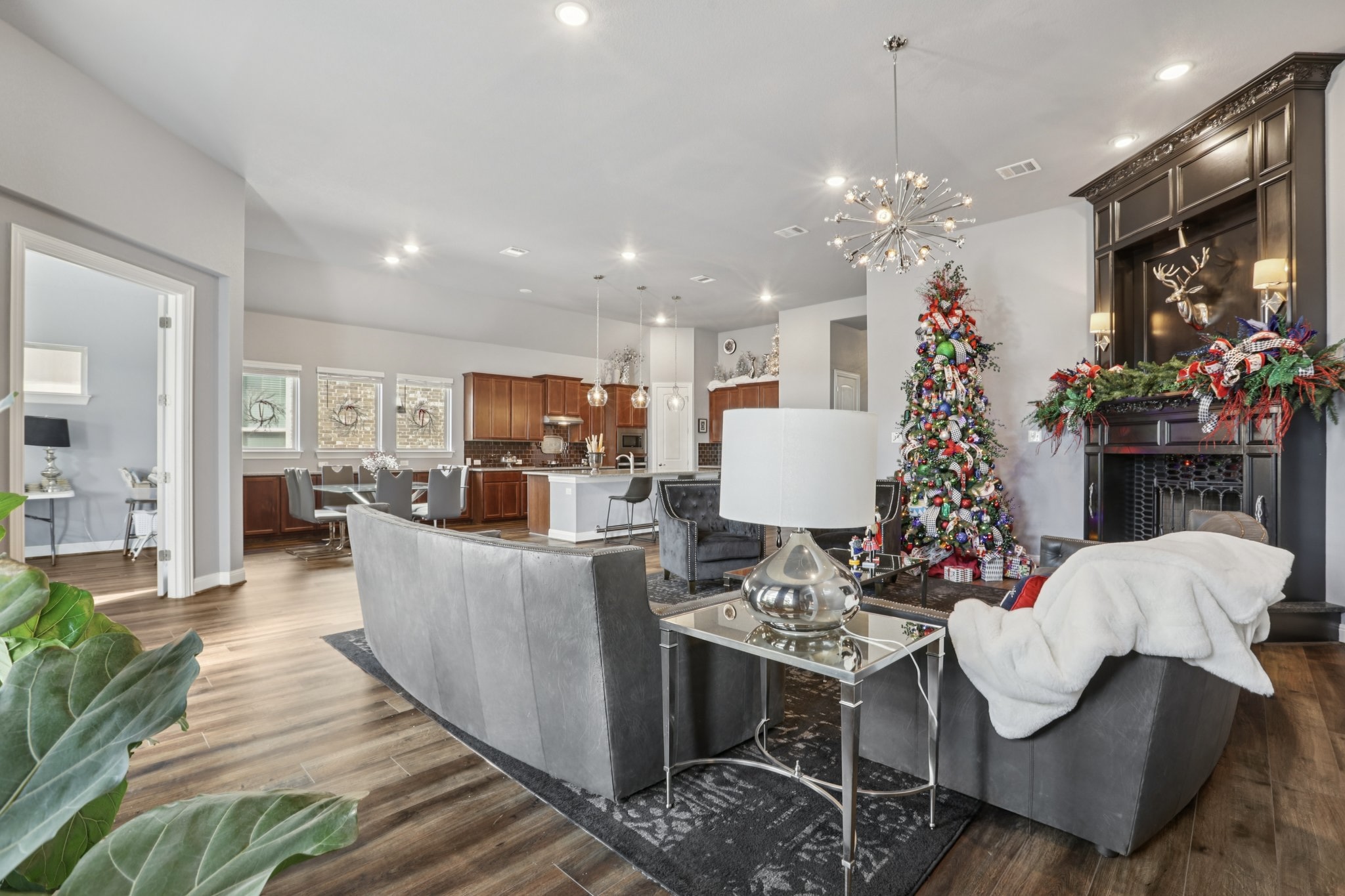 210 Barton Run Drive Georgetown, TX 78628 - Photo 7 of 40 a living room with furniture and a chandelier