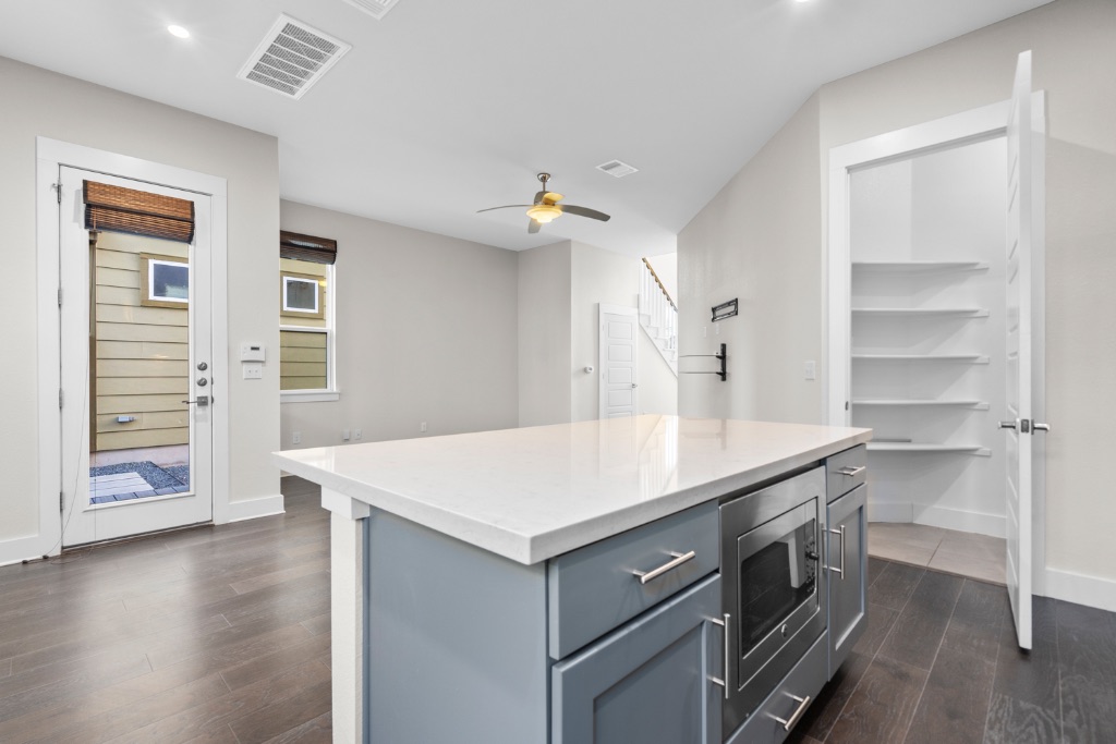 1004 Banyon Street Austin, TX 78757 - Photo 12 of 33 a kitchen with a sink a stove and a refrigerator