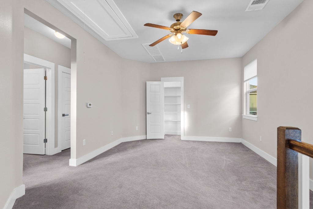 1004 Banyon Street Austin, TX 78757 - Photo 22 of 33 wooden floor in an empty room with a window