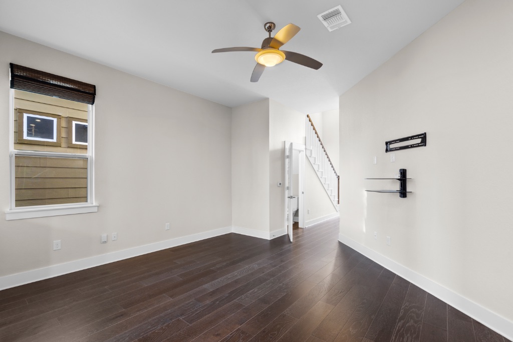 1004 Banyon Street Austin, TX 78757 - Photo 7 of 33 a view of an entryway with wooden floor
