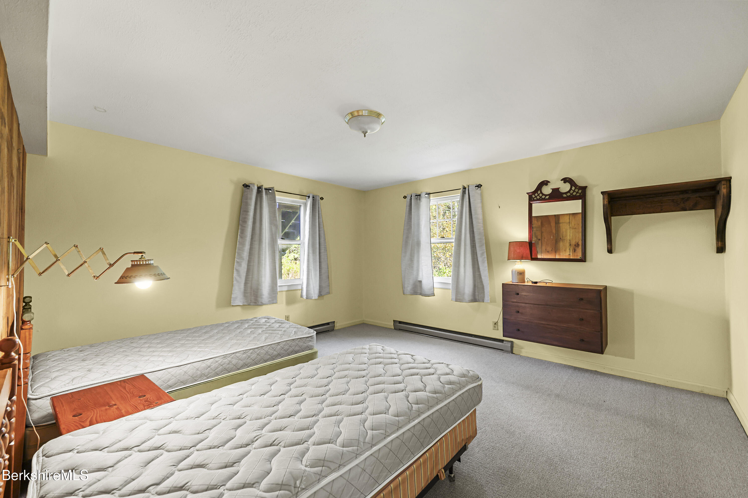 88 East Windsor Road Peru, MA 01235 - Photo 17 of 47 a bedroom with a bed and wooden floor
