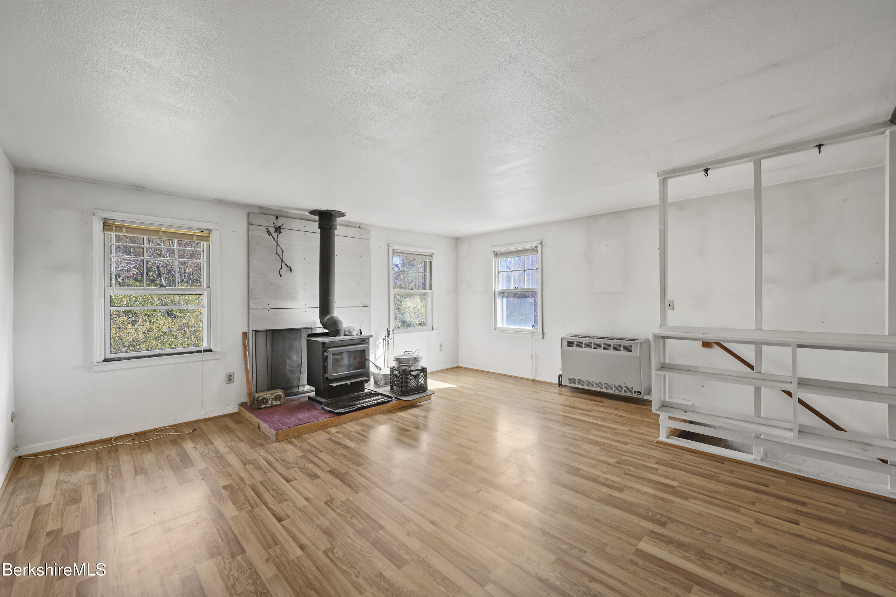 88 East Windsor Road Peru, MA 01235 - Photo 27 of 47 a living room with furniture window and wooden floor