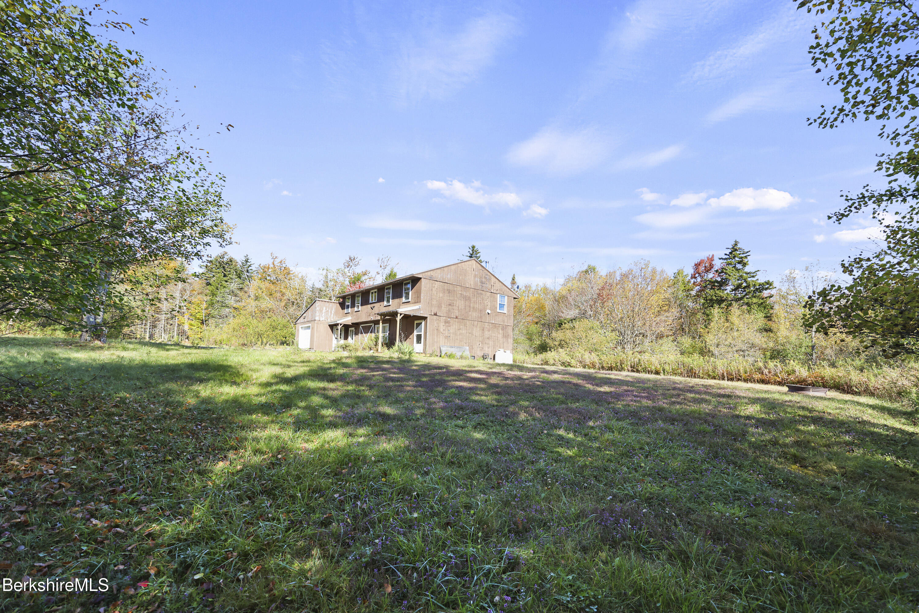 88 East Windsor Road Peru, MA 01235 - Photo 41 of 47 a view of a field with a tree in the background