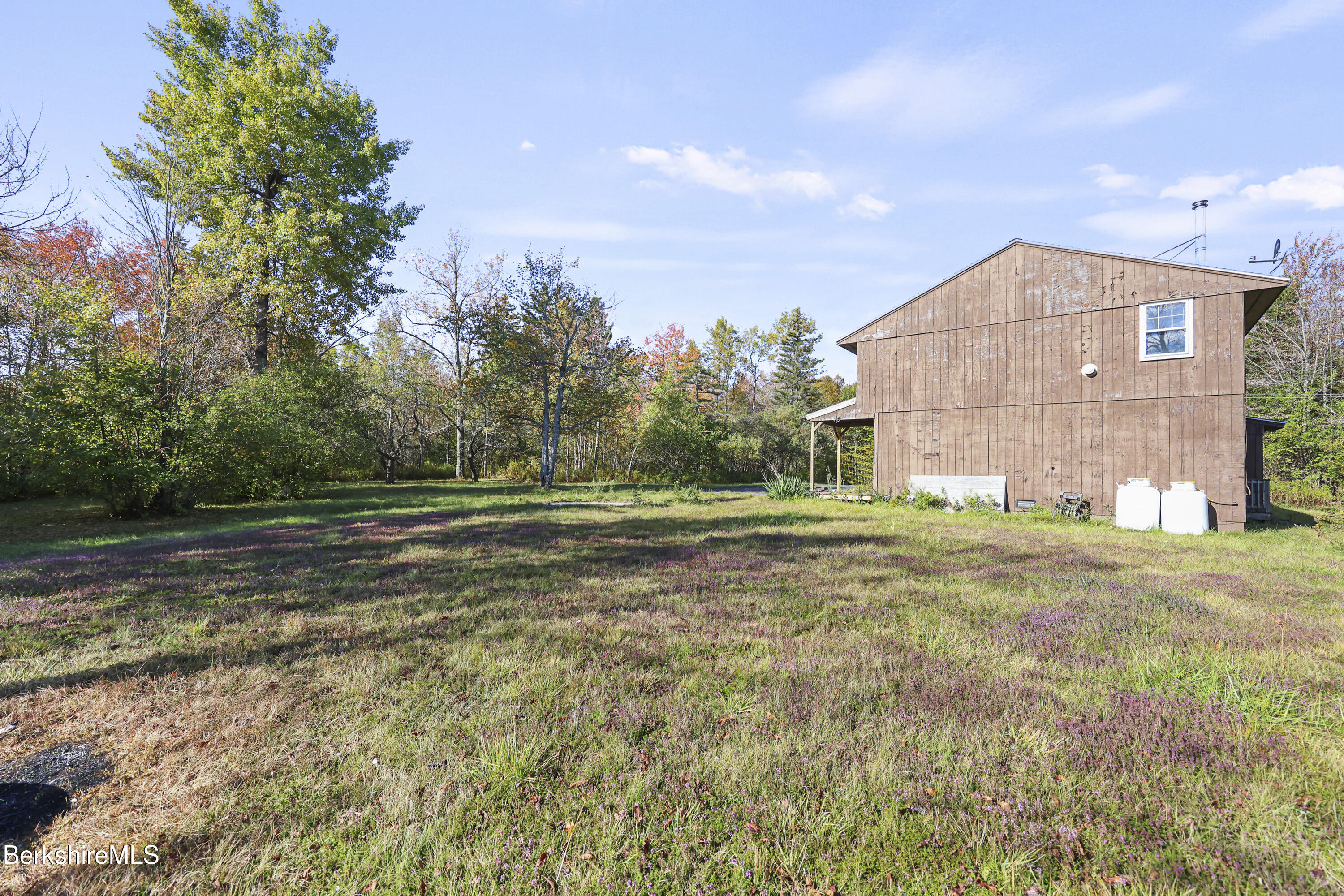 88 East Windsor Road Peru, MA 01235 - Photo 42 of 47 a view of a house with a yard