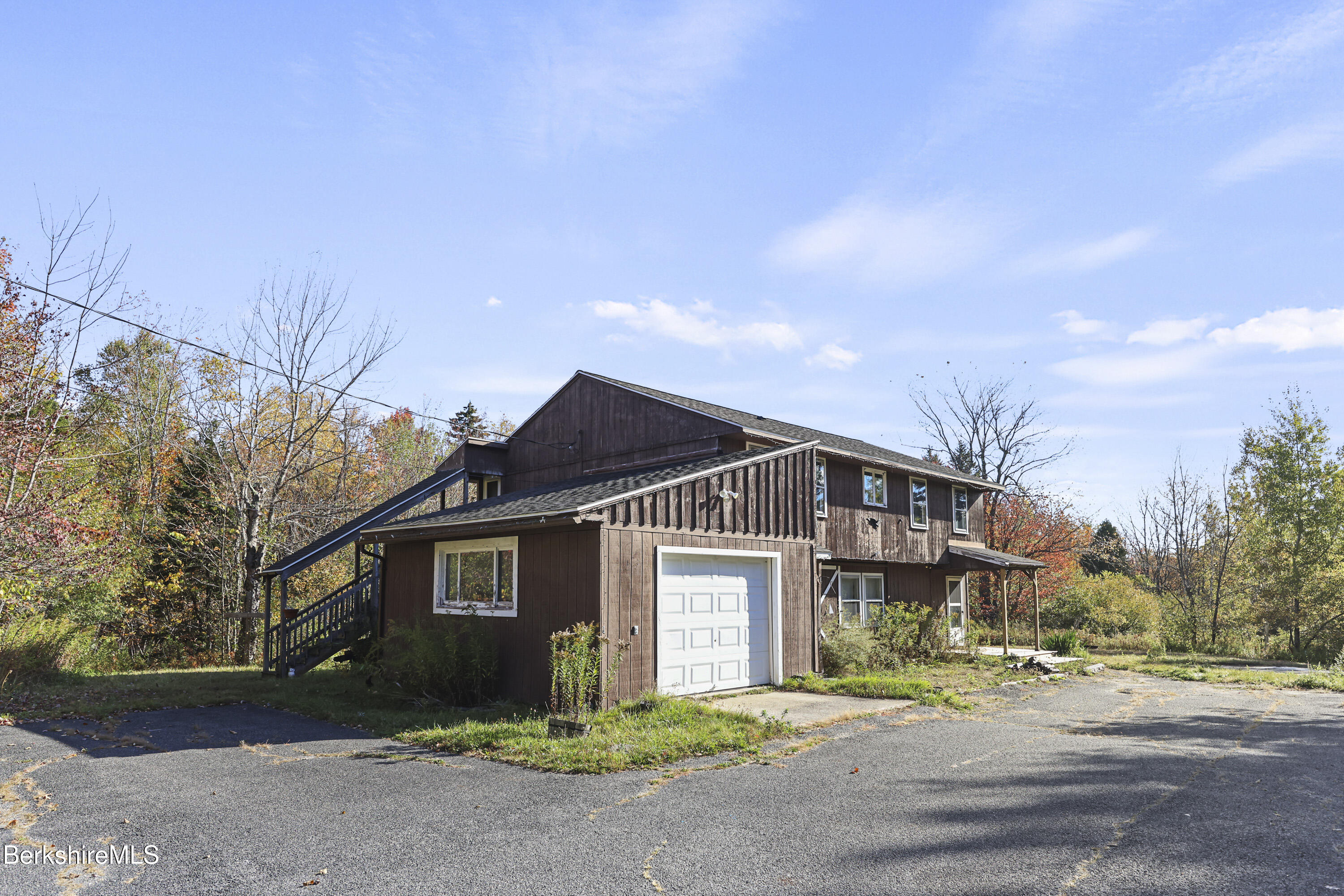 88 East Windsor Road Peru, MA 01235 - Photo 5 of 47 a front view of a house with a yard