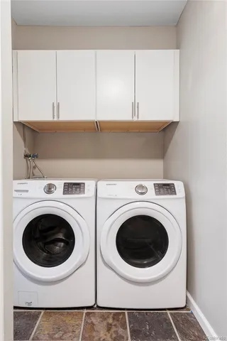 a utility room with dryer and washer