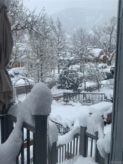 a view of balcony with furniture