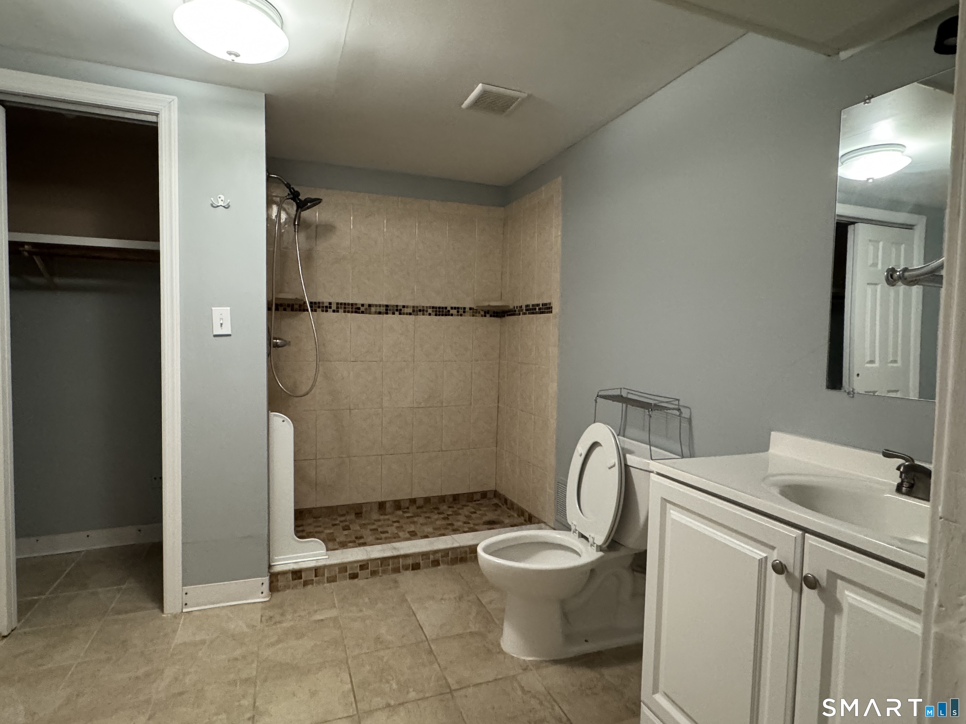 118 Pullen Avenue Watertown, CT 06779 - Photo 4 of 8 a bathroom with a toilet a sink and shower