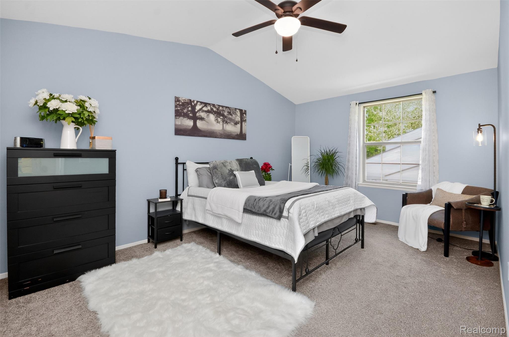 70 Pine Tree Ridge, Unit 2 Waterford, MI 48327 - Photo 17 of 36 Bedroom featuring a ceiling fan and baseboards