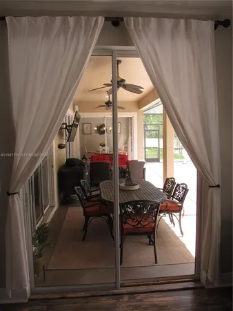 a bathroom with a bathtub and a window