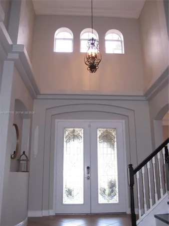 a living room with furniture and window