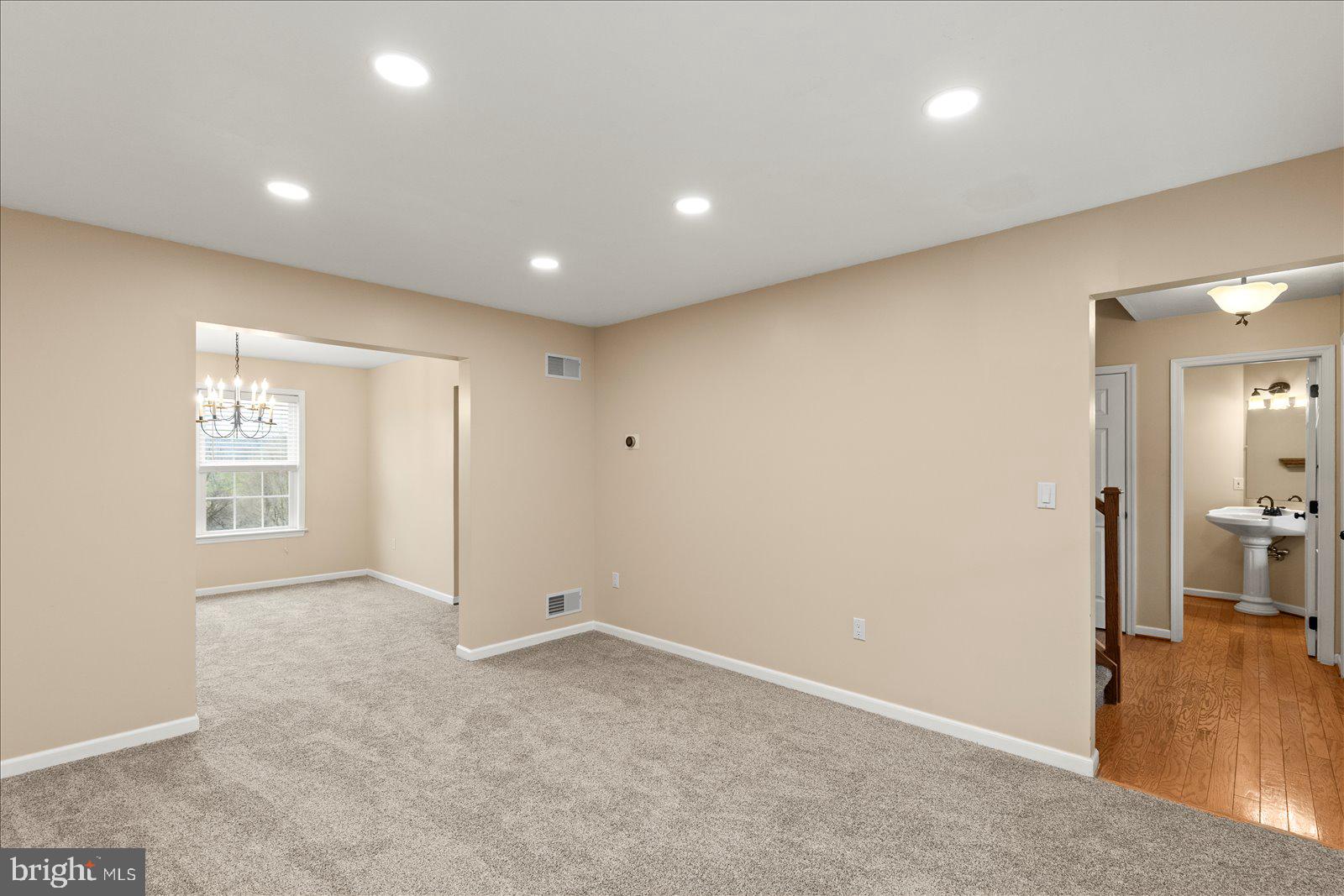 6475 Pamadeva Road Hanover, PA 17331 - Photo 18 of 47 an empty room with wooden floor and windows