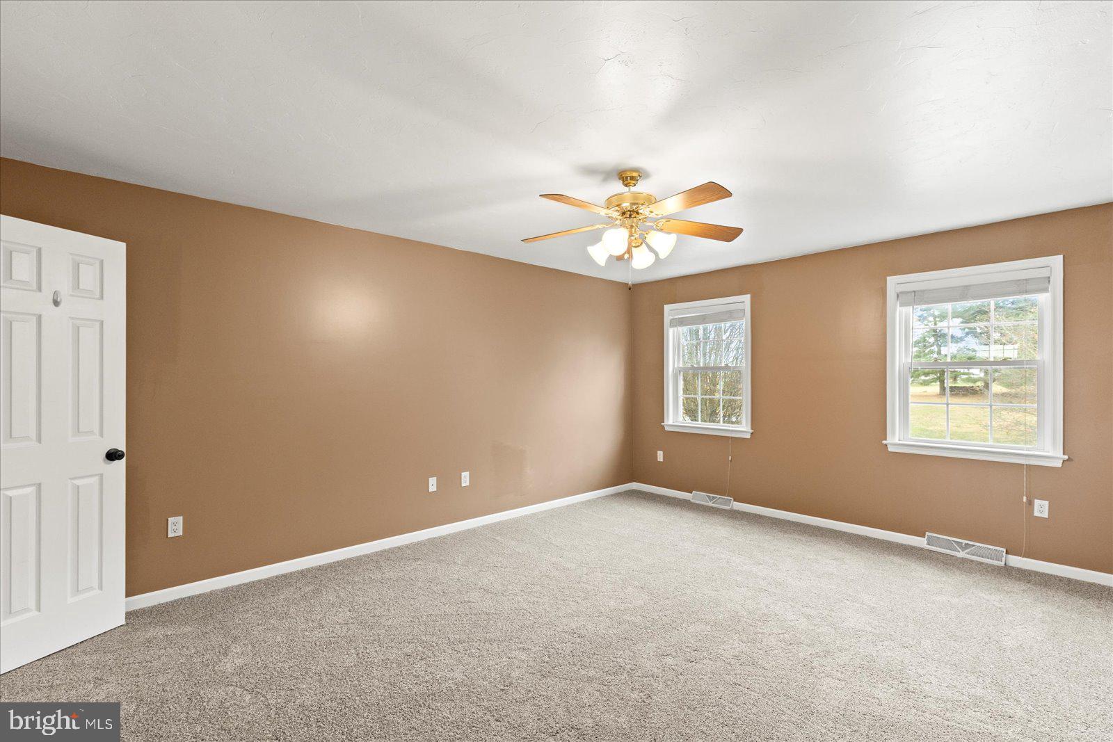 6475 Pamadeva Road Hanover, PA 17331 - Photo 19 of 47 wooden floor in an empty room with a window