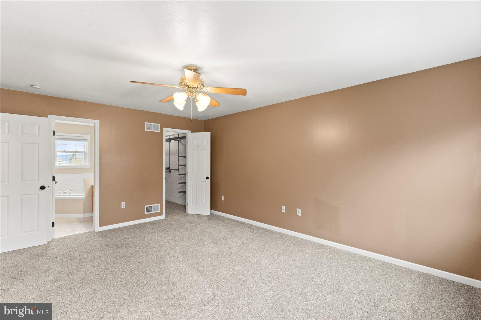 6475 Pamadeva Road Hanover, PA 17331 - Photo 20 of 47 wooden floor in an empty room with a window