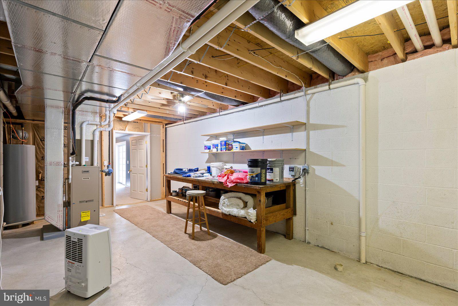 6475 Pamadeva Road Hanover, PA 17331 - Photo 30 of 47 a view of a storage room with a table and chairs