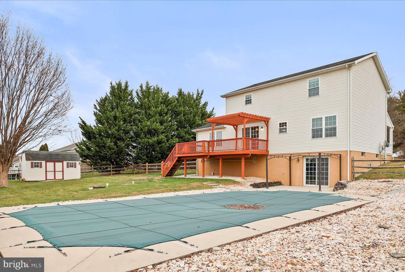 6475 Pamadeva Road Hanover, PA 17331 - Photo 37 of 47 a view of a house with a big yard and large trees
