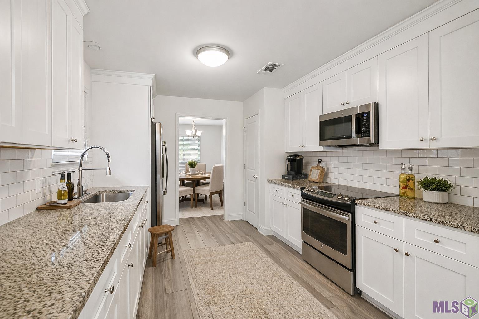 13212 Avants Avenue Baton Rouge, LA 70815 - Photo 5 of 27 Virtually Staged Kitchen
