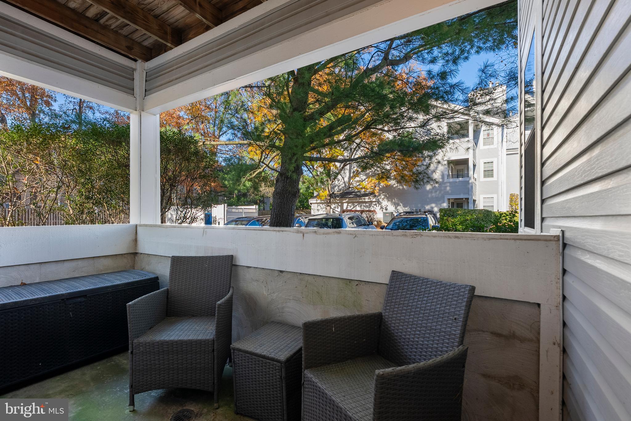 606 Moonglow Road, Unit 103 Odenton, MD 21113 - Photo 15 of 15 a outdoor living space with patio furniture and garden view