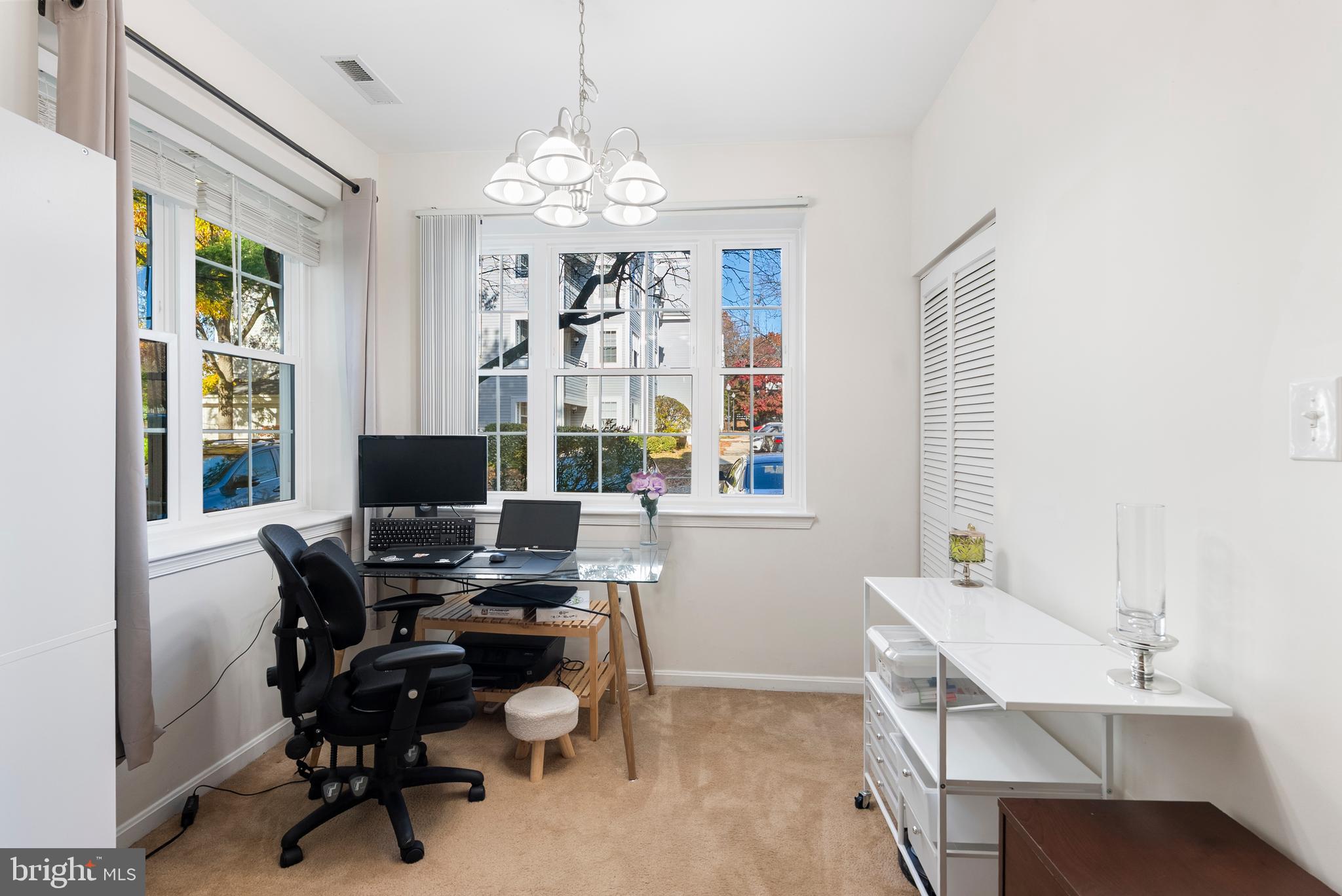 606 Moonglow Road, Unit 103 Odenton, MD 21113 - Photo 5 of 15 a view of a workspace with furniture and a window