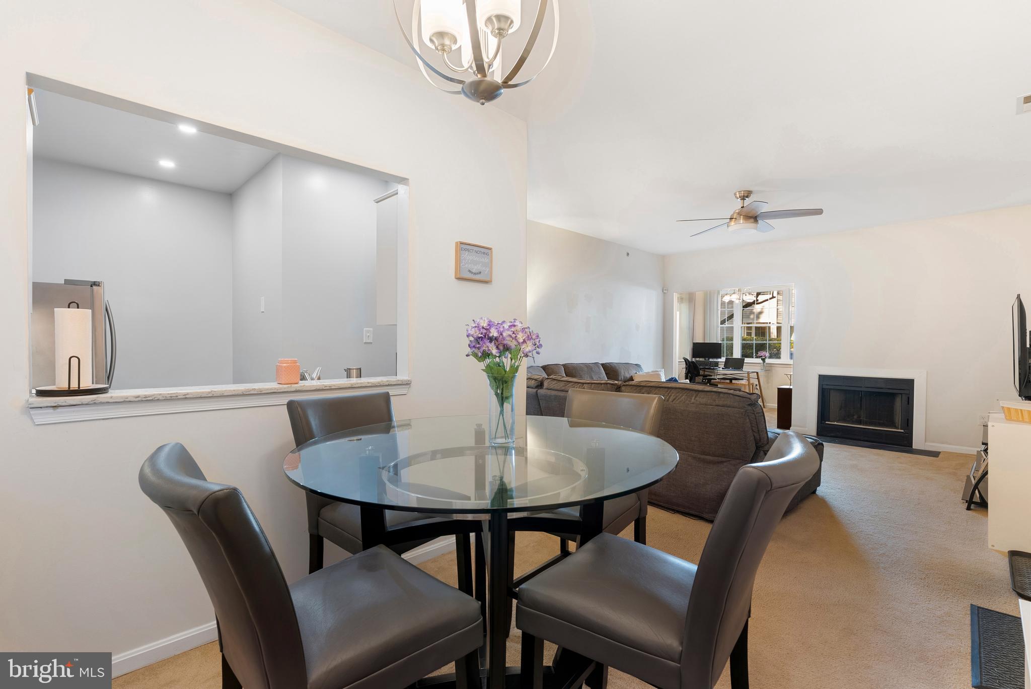 606 Moonglow Road, Unit 103 Odenton, MD 21113 - Photo 7 of 15 a view of a dining room with furniture