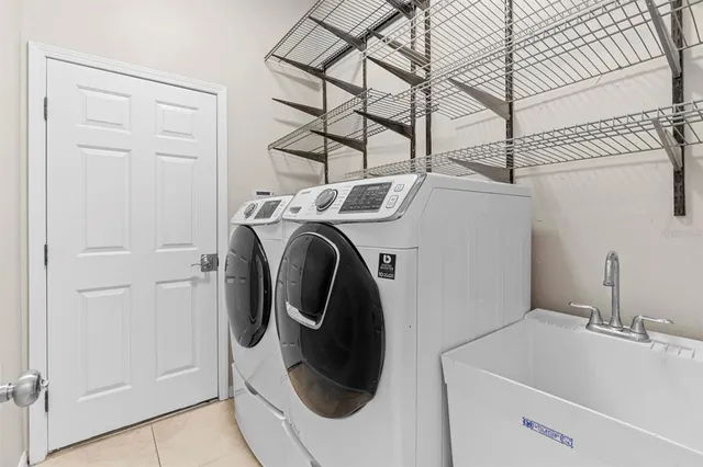a utility room with dryer and washer