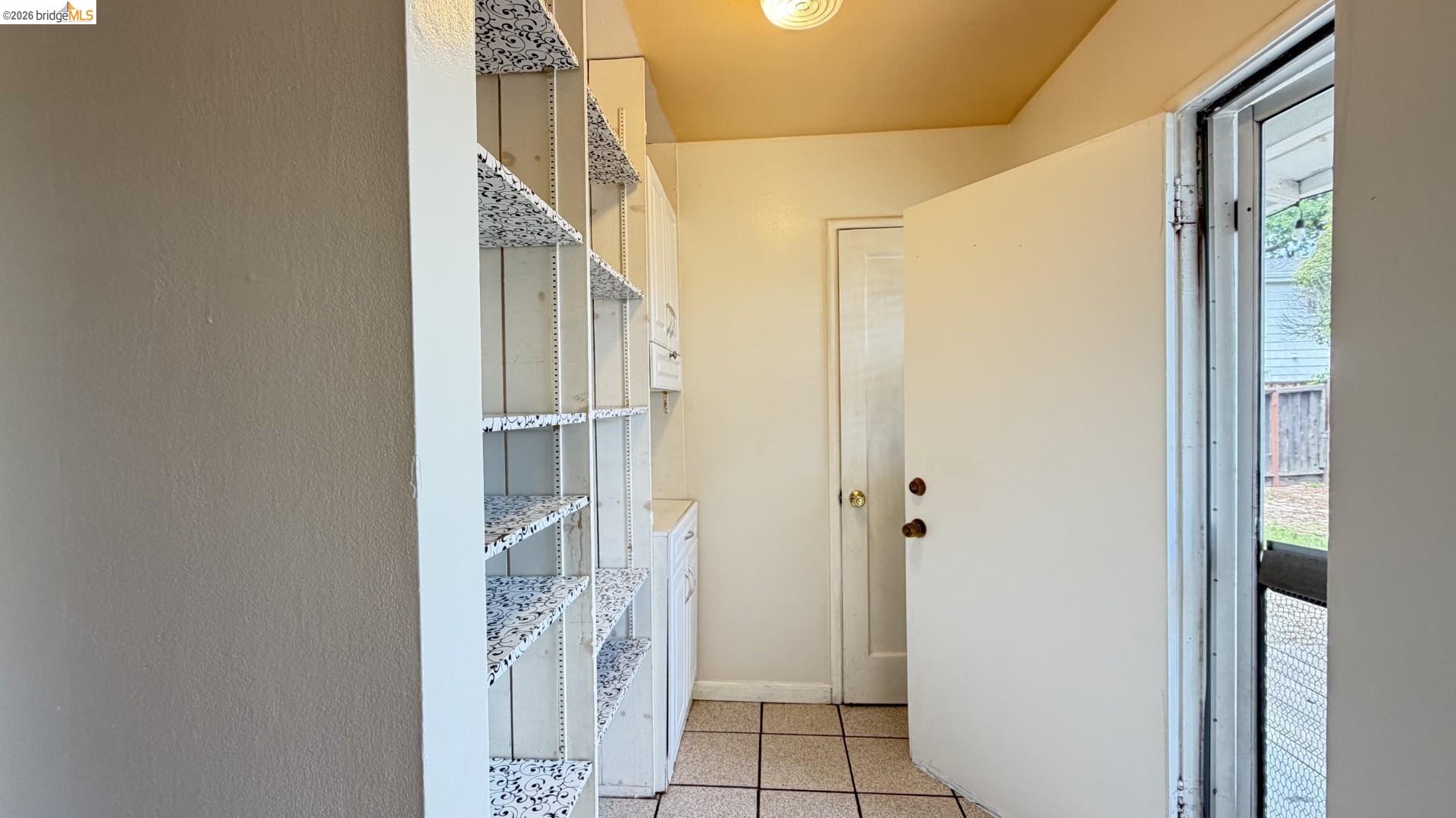 3407 Cowell Road Concord, CA 94518 - Photo 12 of 24 Laundry room featuring baseboards