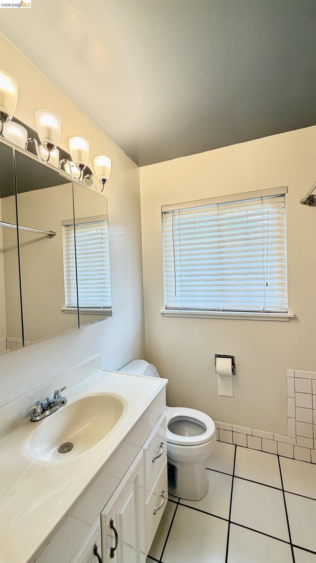 3407 Cowell Road Concord, CA 94518 - Photo 13 of 24 Full bath featuring vanity and light tile patterned floors