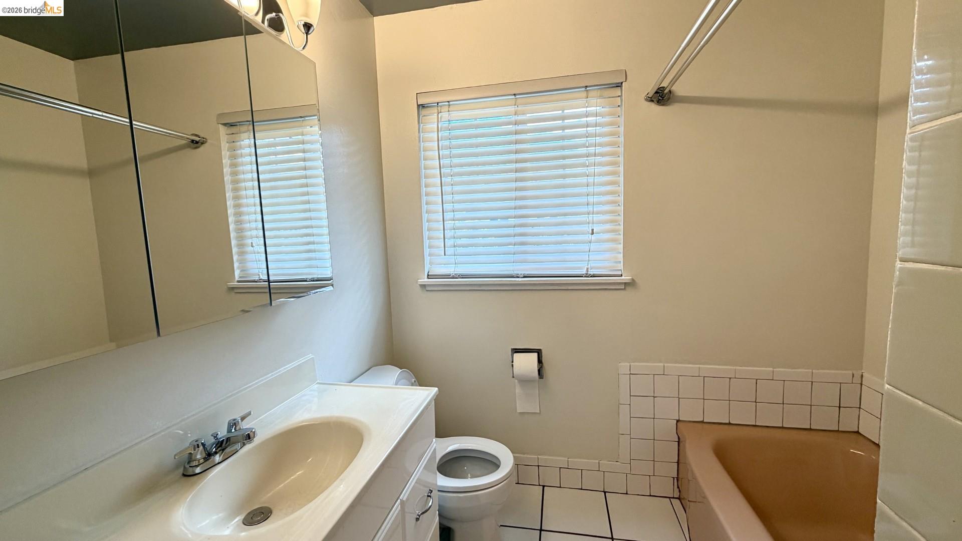 3407 Cowell Road Concord, CA 94518 - Photo 14 of 24 Full bath featuring a bath, vanity, and light tile patterned floors