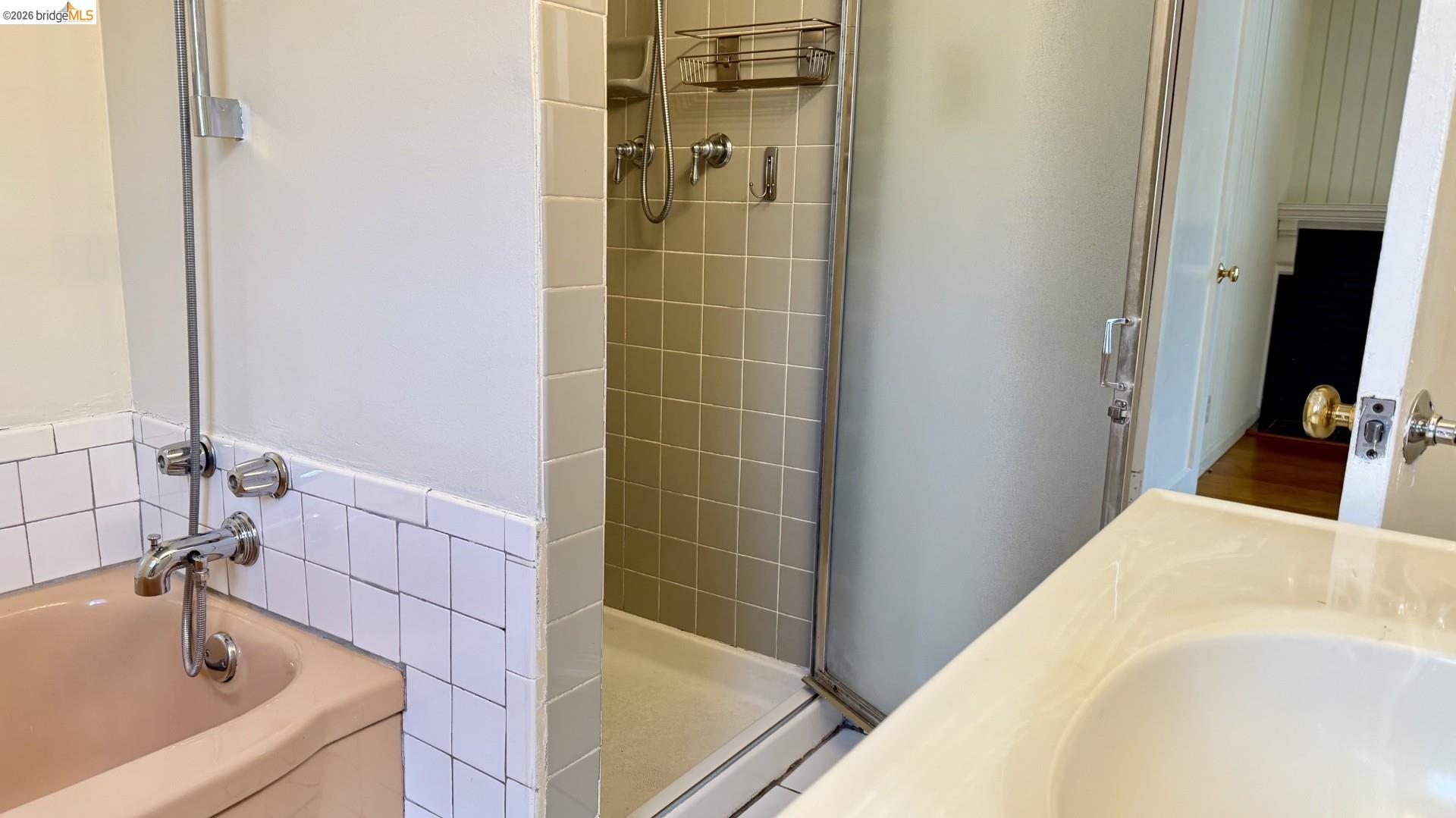 3407 Cowell Road Concord, CA 94518 - Photo 15 of 24 Full bathroom with a garden tub, a shower stall, and vanity