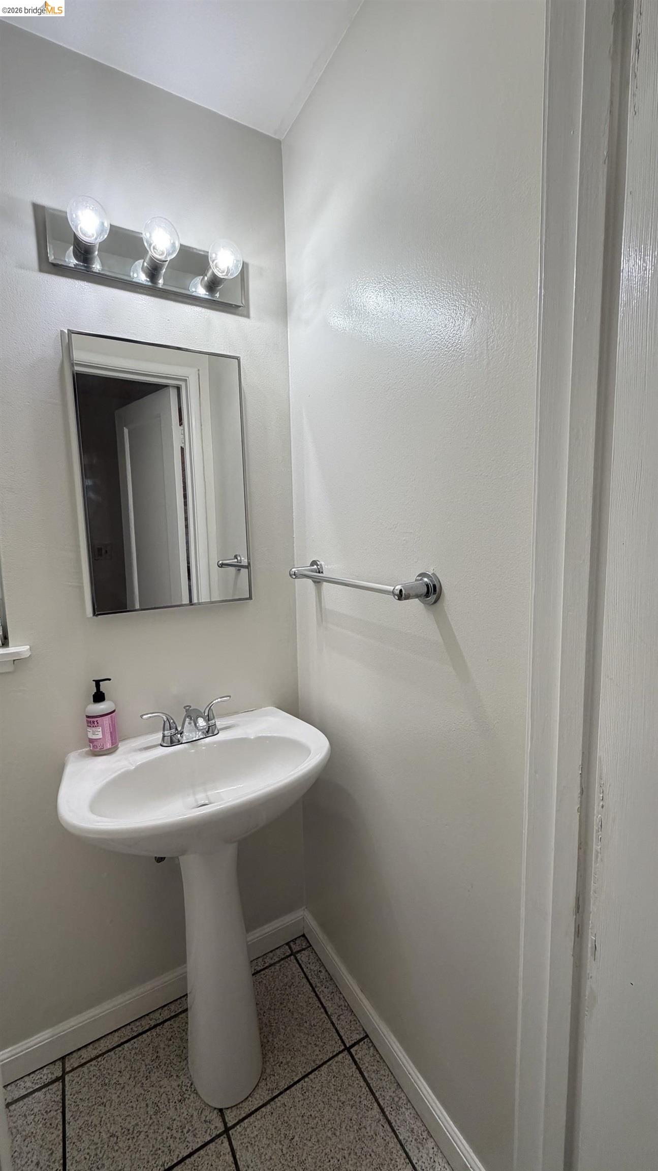 3407 Cowell Road Concord, CA 94518 - Photo 17 of 24 Bathroom with dark speckled floor and baseboards