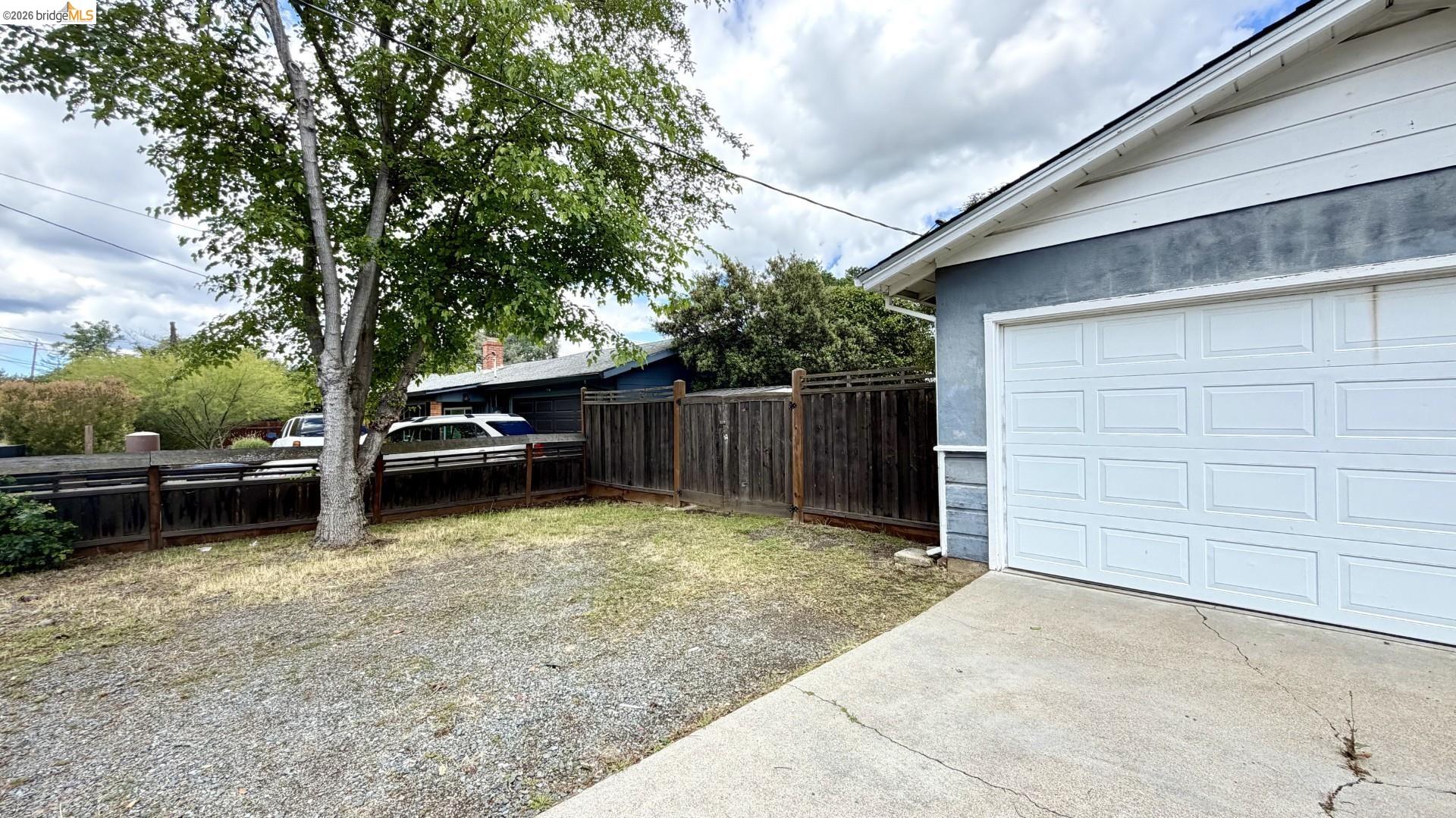 3407 Cowell Road Concord, CA 94518 - Photo 23 of 24 Garage featuring driveway