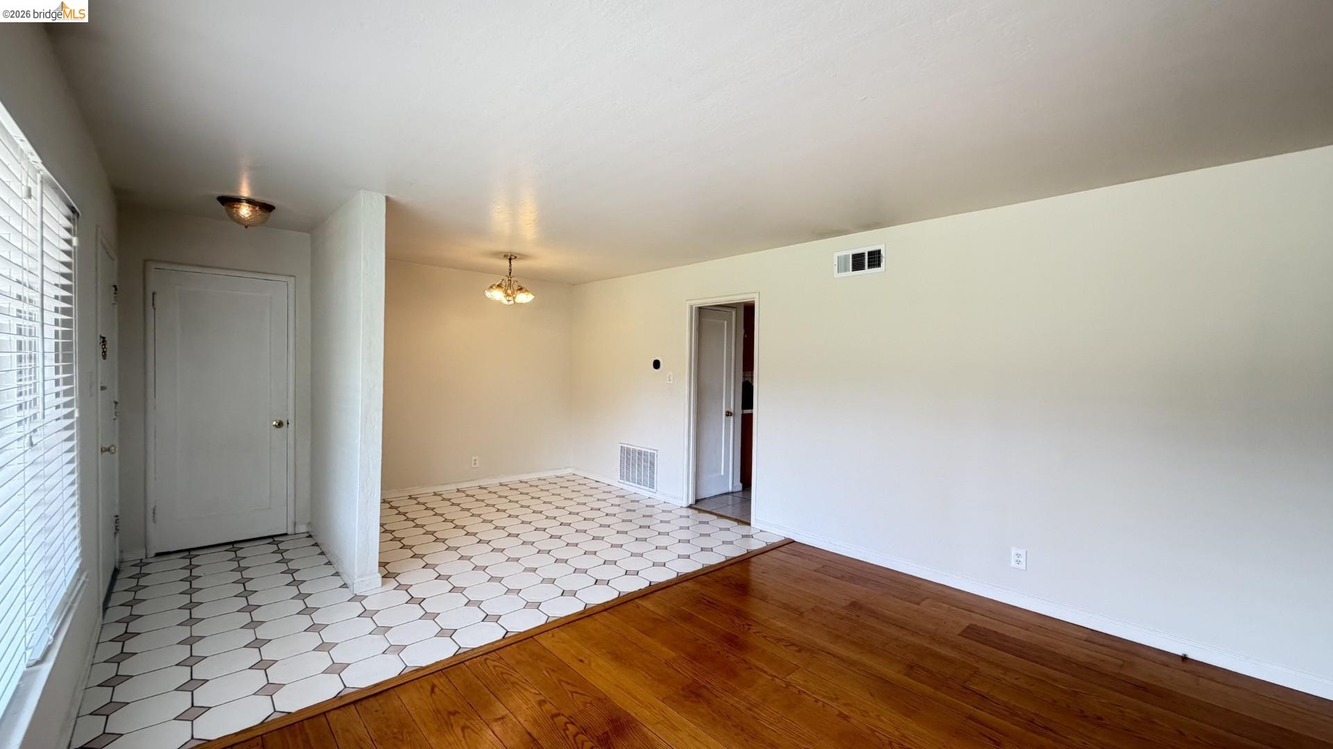 3407 Cowell Road Concord, CA 94518 - Photo 4 of 24 Unfurnished room with baseboards and light wood-style floors